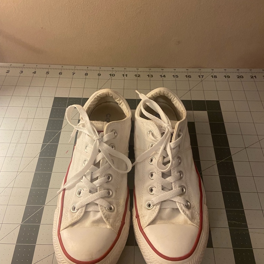 Converse White Sneakers with Subtle Red Accents